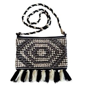 America & Beyond Crossbody Black & Cream Tasseled Weave Braided Strap Zip Top